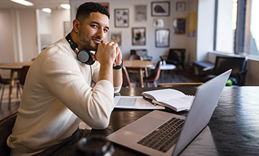 Guy sitting at desk