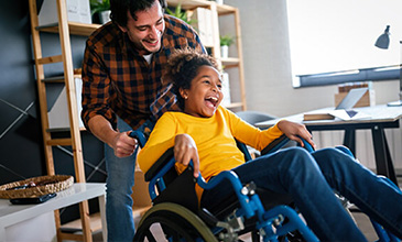 Man with child laughing