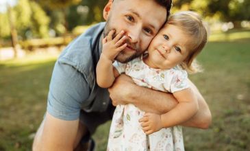 Man with little girl