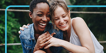 happy friends smiling outdoors